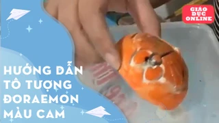Hướng dẫn tô tượng mặt đoraemon màu cam